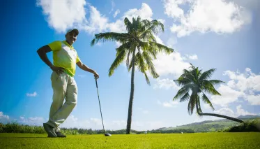 Joueur au Golf de Bel Ombre