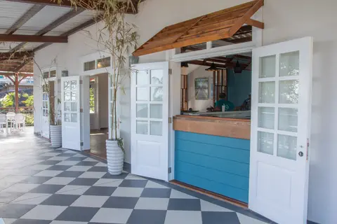 The blue counter and checkerboard floor